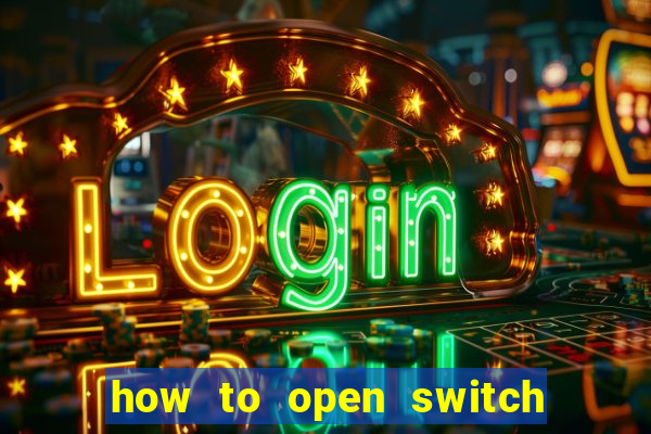 how to open switch oled game card slot