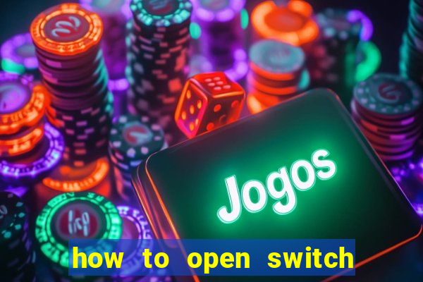 how to open switch oled game card slot